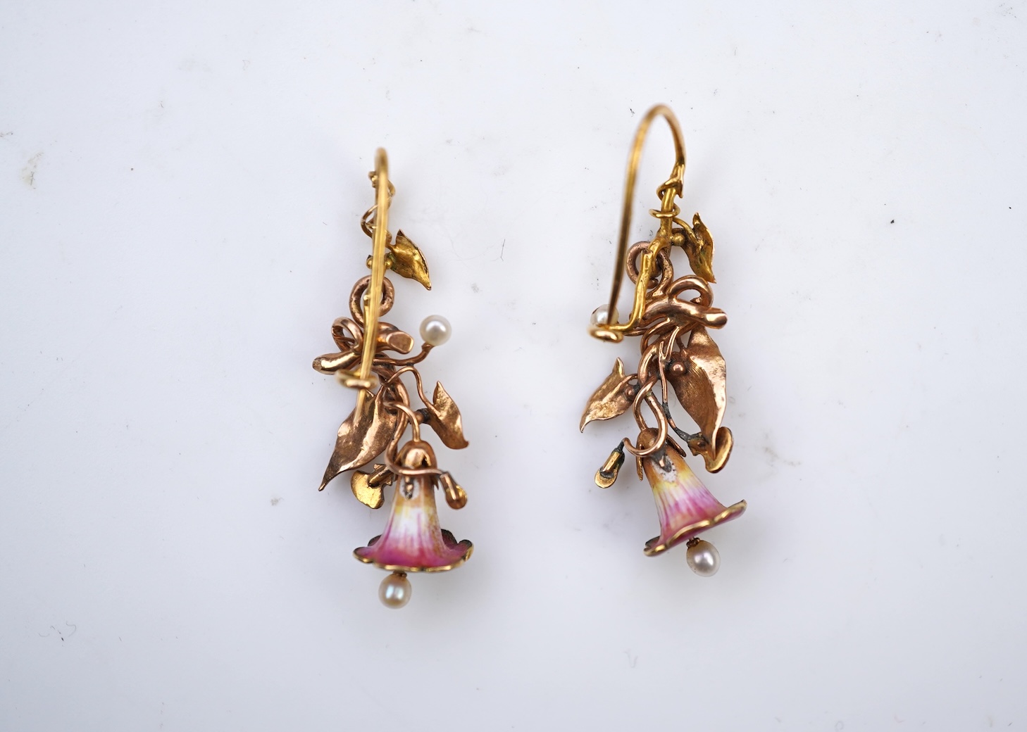 A rare pair of naturalistic gold, enamel and seed pearl earrings, circa 1850